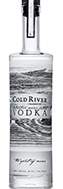 Cold River Vodka Eine ansprechende Vodkaflasche mit dem Namen "Cold River Vodka" vor einem natürlichen Hintergrund.